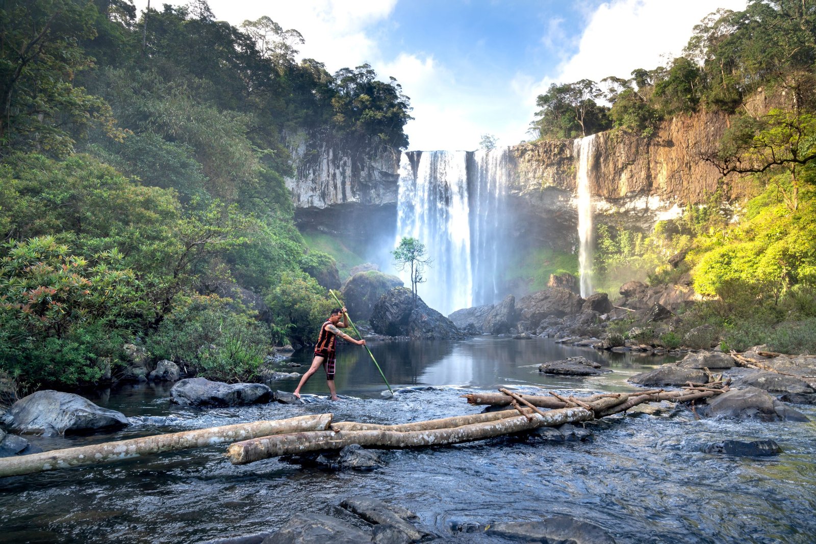 Scenic Du Gia Waterfall, a popular swimming spot on the Ha Giang Loop tour