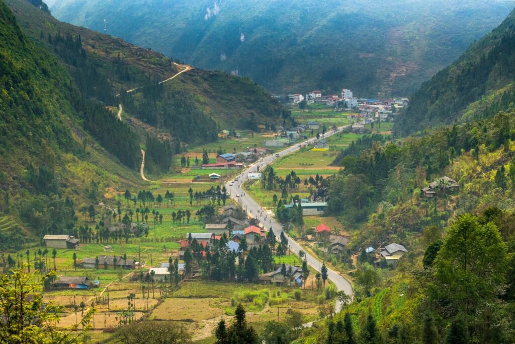 Ethnic minority children in traditional clothing in a Ha Giang village